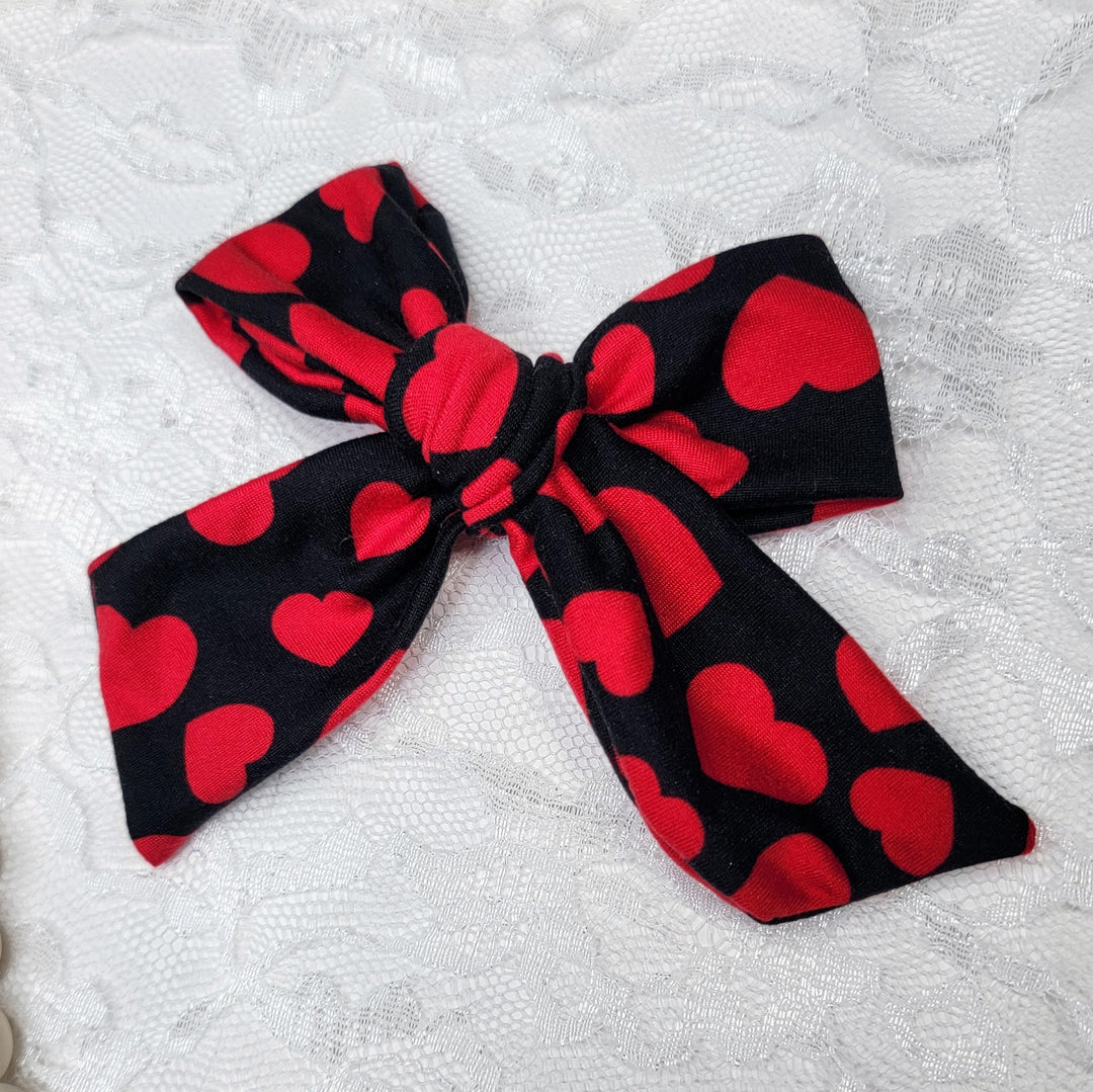 Red Hearts on Black Dainty Bow (on clips)