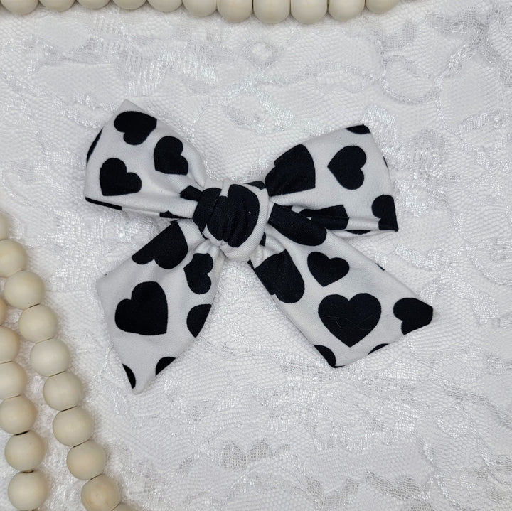 Black Hearts on White Dainty Bow (on clips)