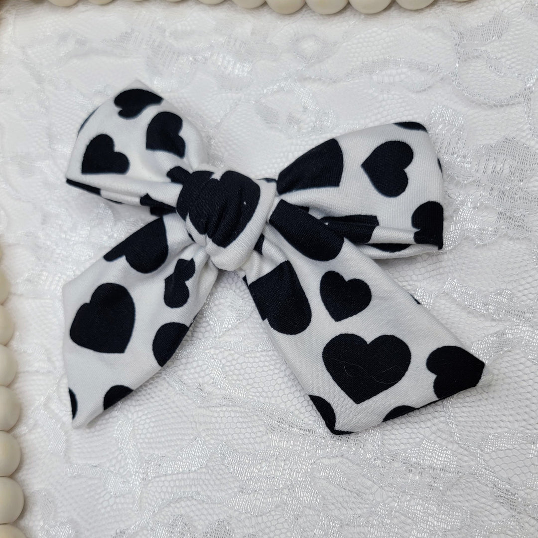 Black Hearts on White Dainty Bow (on clips)